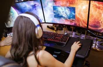 Female streamer at her gaming setup streaming for her audience