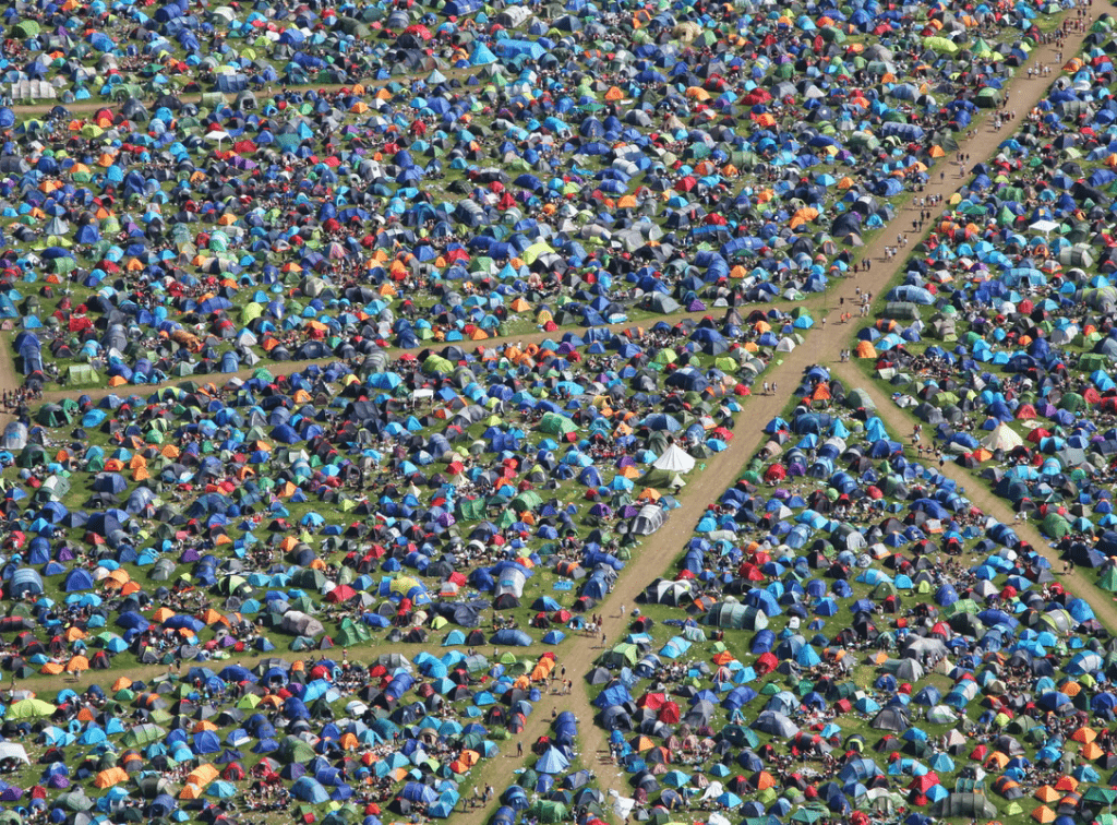 A bird’s eye view of pitched tents at a music festival 