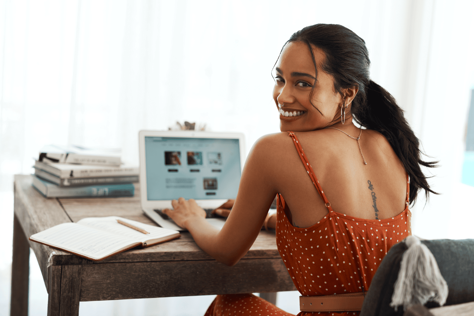  A blogger smiling at her desk